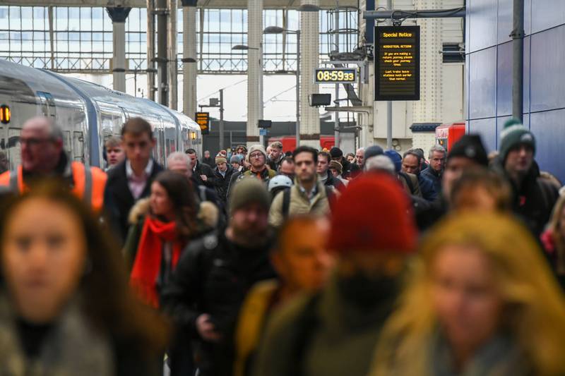 On Tuesday, rail travel in the UK ground to yet another halt as staff went on strike. Here, commuters arrive on one of the limited services at London's Waterloo Station. Bloomberg