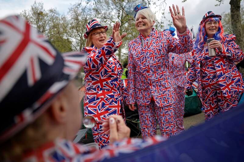 Royal enthusiasts at their impromptu campsite on The Mall in London, where they await the May 6 coronation procession of King Charles III. Getty 