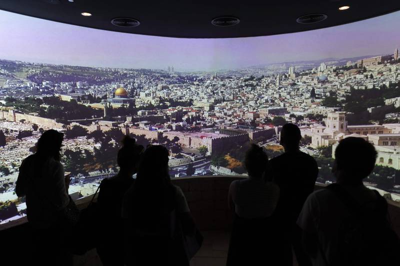 Visitors then take an atmospheric elevator ride that simulates rising high above the bustling streets of Jerusalem. AFP