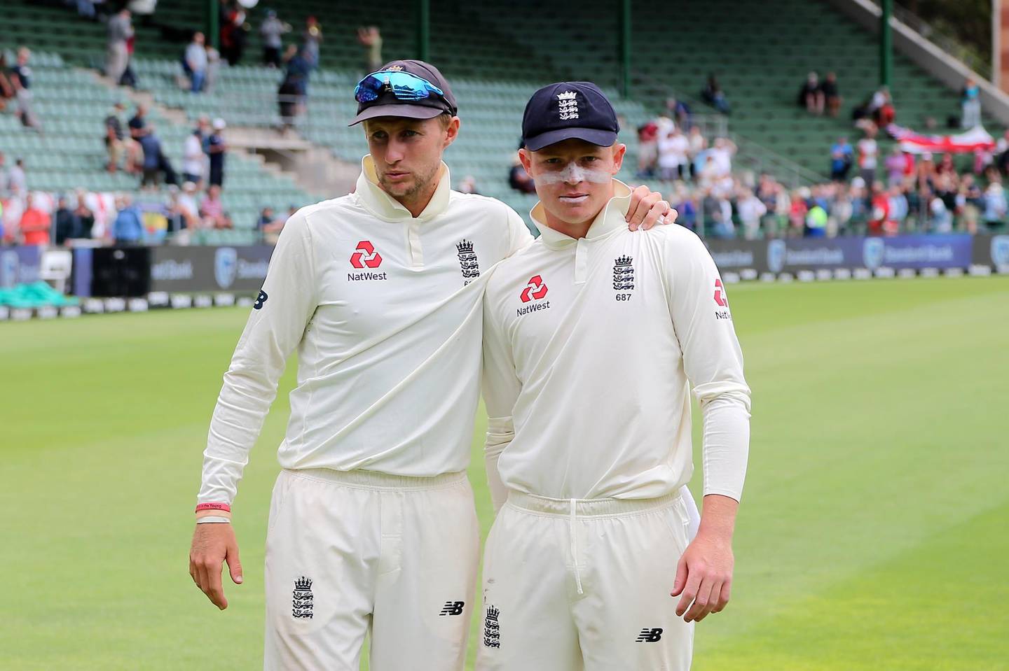 England's Joe Root (L) and England's Ollie Pope pose for a poartrait during the fifth day of the third Test cricket match between South Africa and England at the St George's Park Cricket Ground in Port Elizabeth on January 20, 2020 / AFP / Richard Huggard
