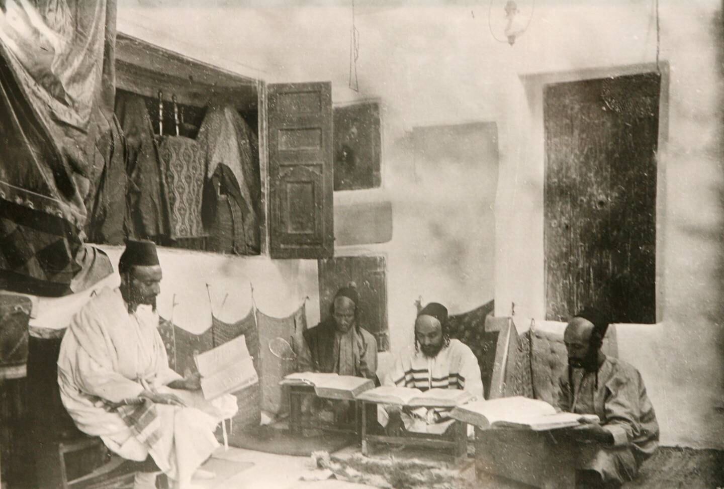 Abu Dhabi, UAE - May 18, 2009 - Jews studying the Torah in a synagogue, 1907. Part of Zayed University exhibit of historical photographs. (Nicole Hill / The National) *** Local Caption ***  NH Zayed06.jpgNH Zayed06.jpgNH Zayed06.jpg