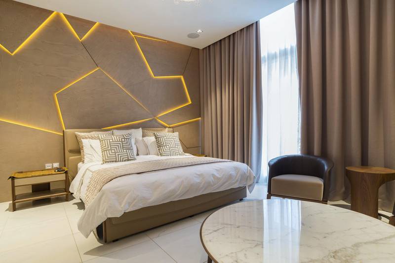 The contemporary feel extends to the bedrooms. Courtesy LuxuryProperty.com