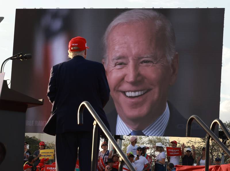 Attending a rally for Marco Rubio in Miami, Donald Trump watches a video of US President Joe Biden speaking. Getty / AFP