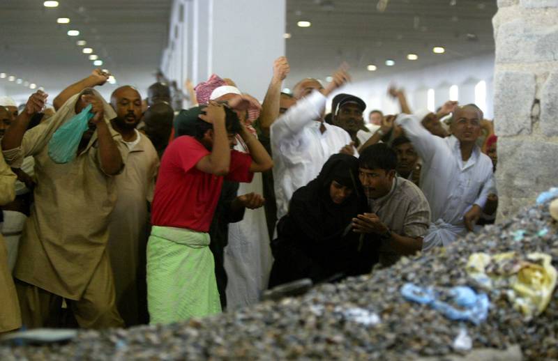 Pilgrims participating in Hajj in 2004 perform the Jamarat ritual, when Muslims must throw 21 stones at three pillars in Mina.