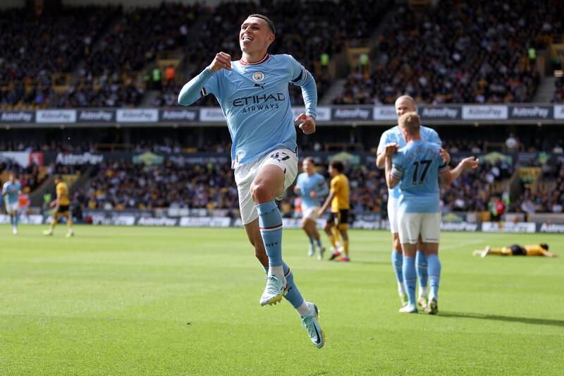 Phil Foden celebrates after scoring. Getty