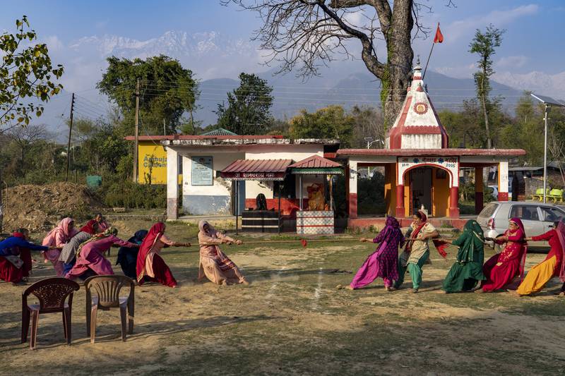 Women compete in a tug-of-war game in the compound of a Hindu temple in Hungloh, a village south of Dharamshala, India. AP