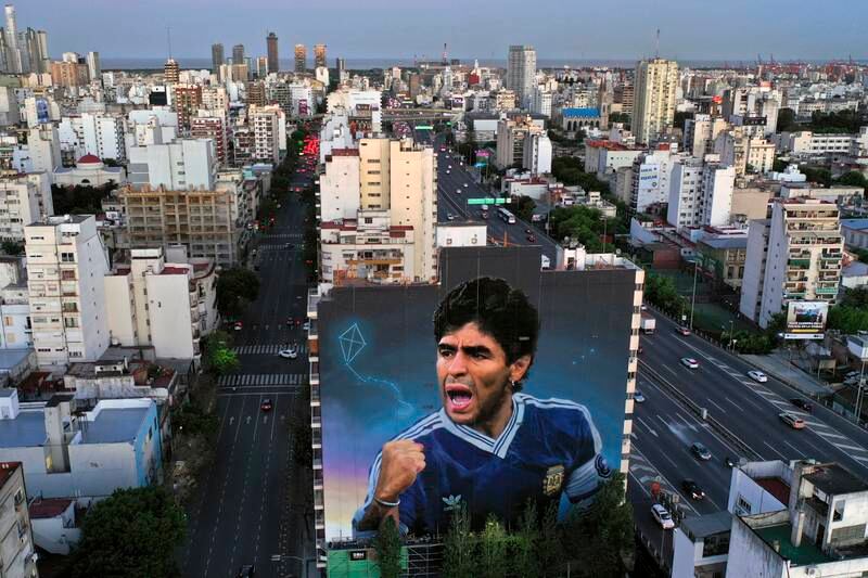 A giant mural late Argentine footballer Diego Maradona, by artist Martin Ron, in Buenos Aires. Getty Images