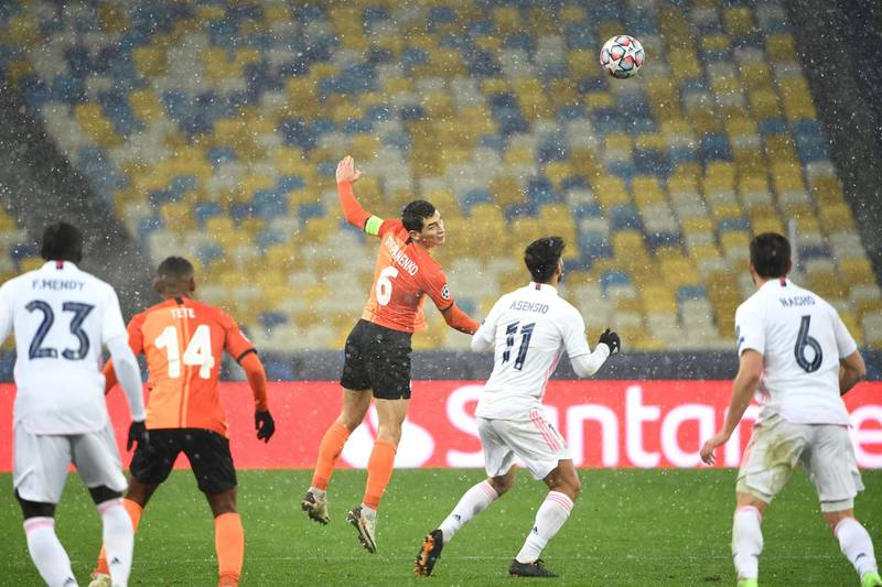 Shakhtar Donetsk midfielder Taras Stepanenko heads the ball during the Champions League match against Real Madrid. AFP