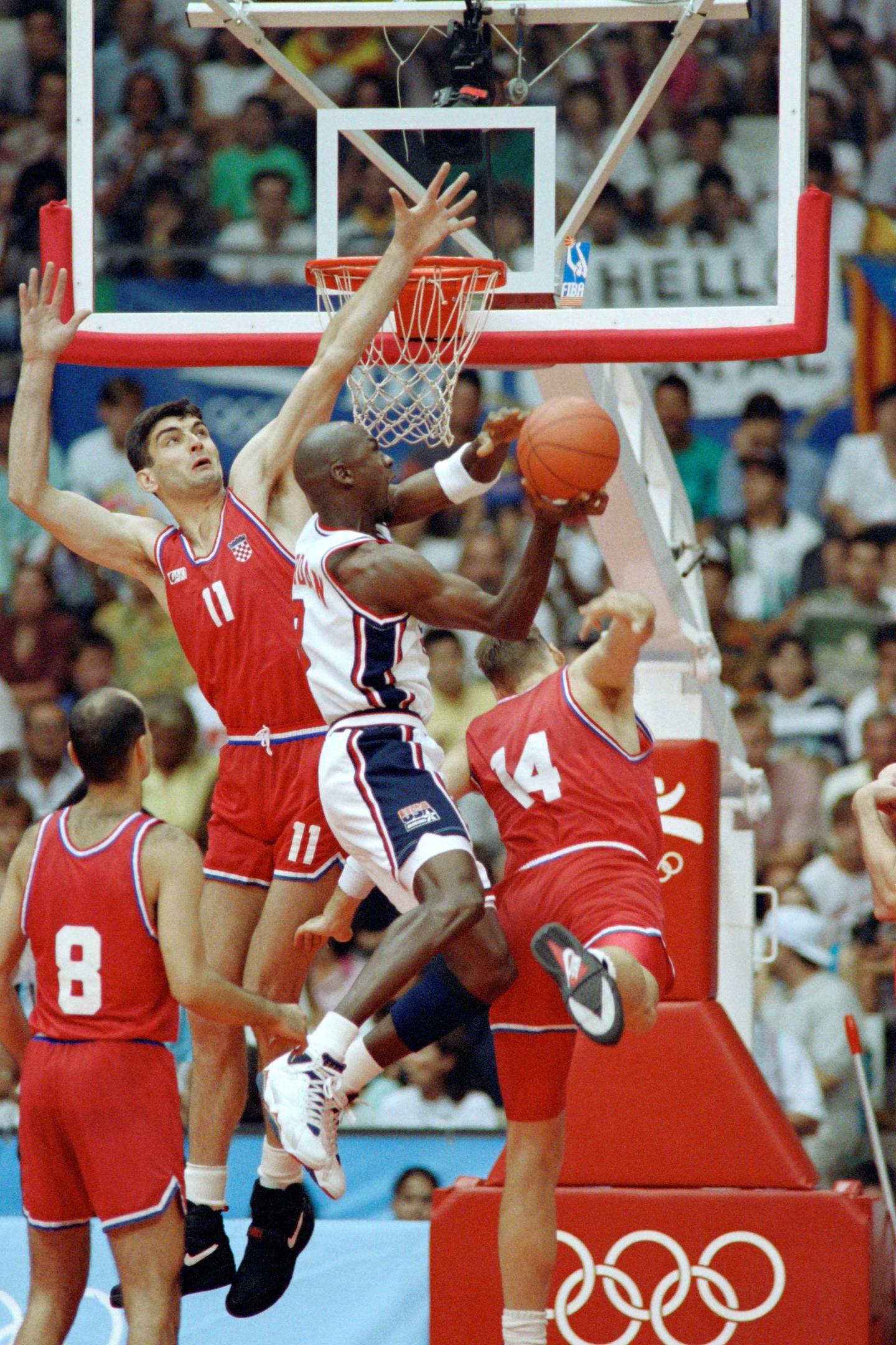 American basketball star Michael Jordan smashes during the final of the 1992 Barcelona Olympic basketball tournament opposing the USA to Croatia on August 08, 1992, in Barcelona. (Photo by - / IOPP / AFP)