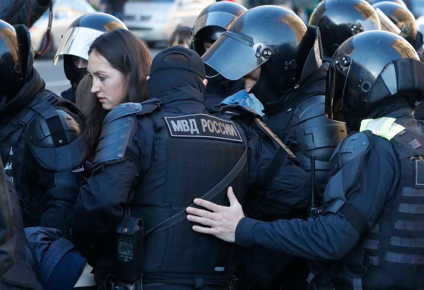 Police detain a person taking part in a protest in St Petersburg.  EPA