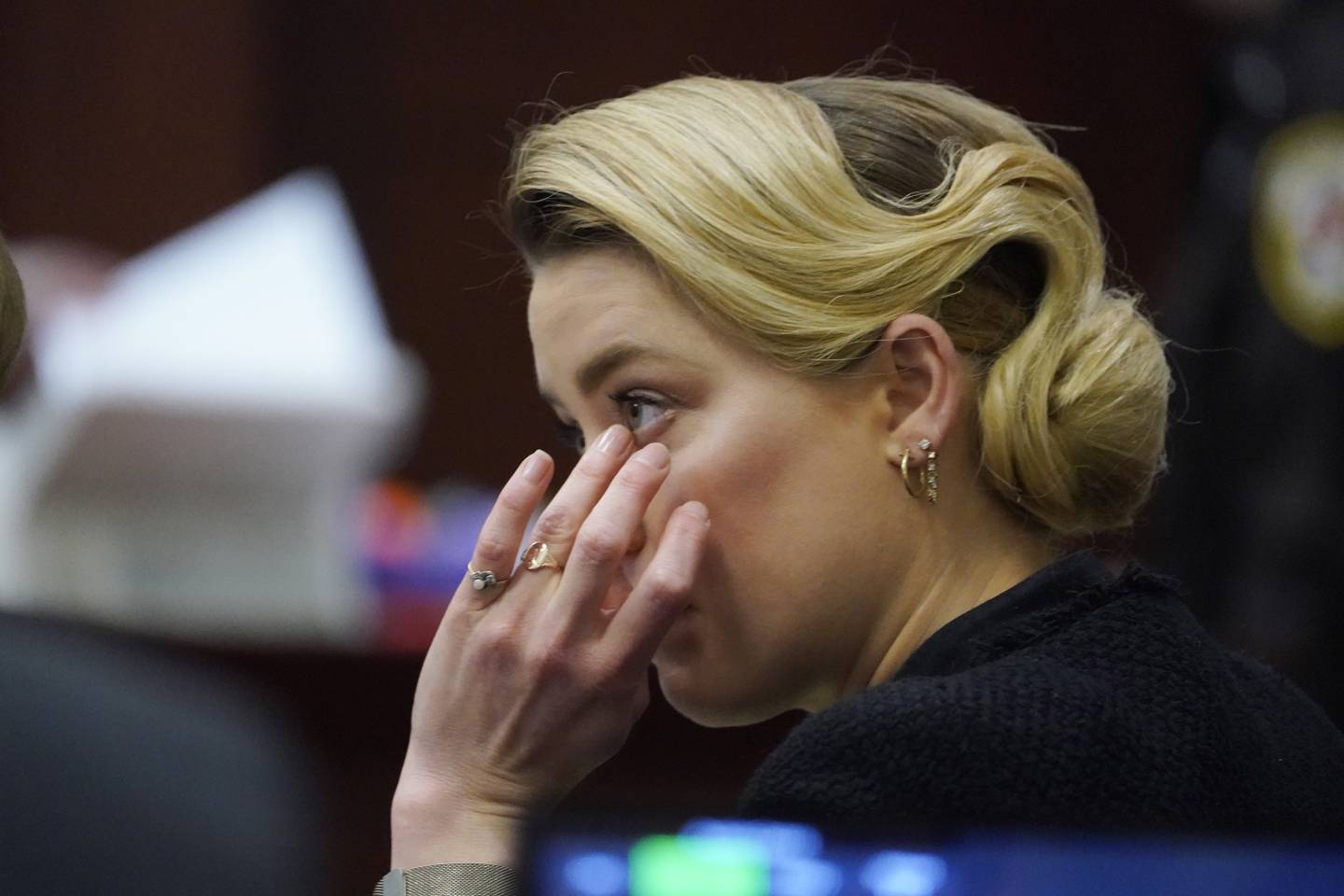 Actress Amber Heard listens in the courtroom at the Fairfax County Circuit Courthouse in Fairfax, Virginia. EPA