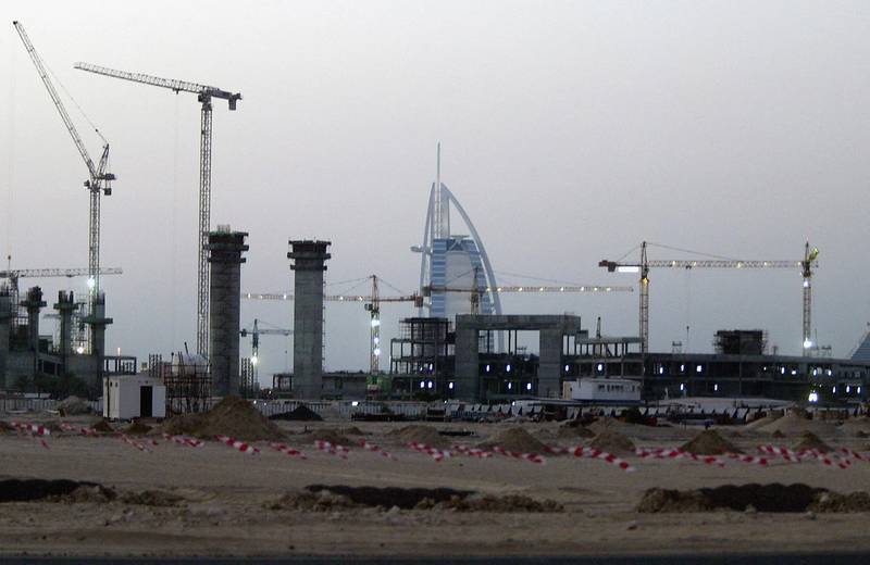 Mall of the Emirates under construction, with Dubai's landmark hotel Burj Al Arab in the background, in September 2004. AFP