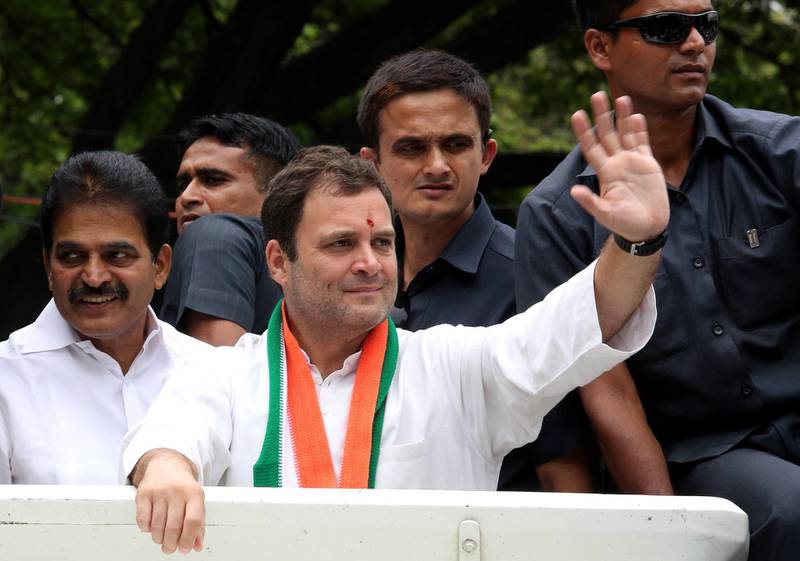 epa06722407 The All India Congress Committee (AICC) party president Rahul Gandhi waves to his supporters during a political road show rally, ahead of Karnataka Assembly Election in Bangalore, India, 09 May 2018. The election will be held in the southwest Indian state of Karnataka on 12 May 2018, in all of its 224 Legislative Assembly constituencies. Vote counting and results will be announced on 15 May 2018.  EPA/JAGADEESH NV