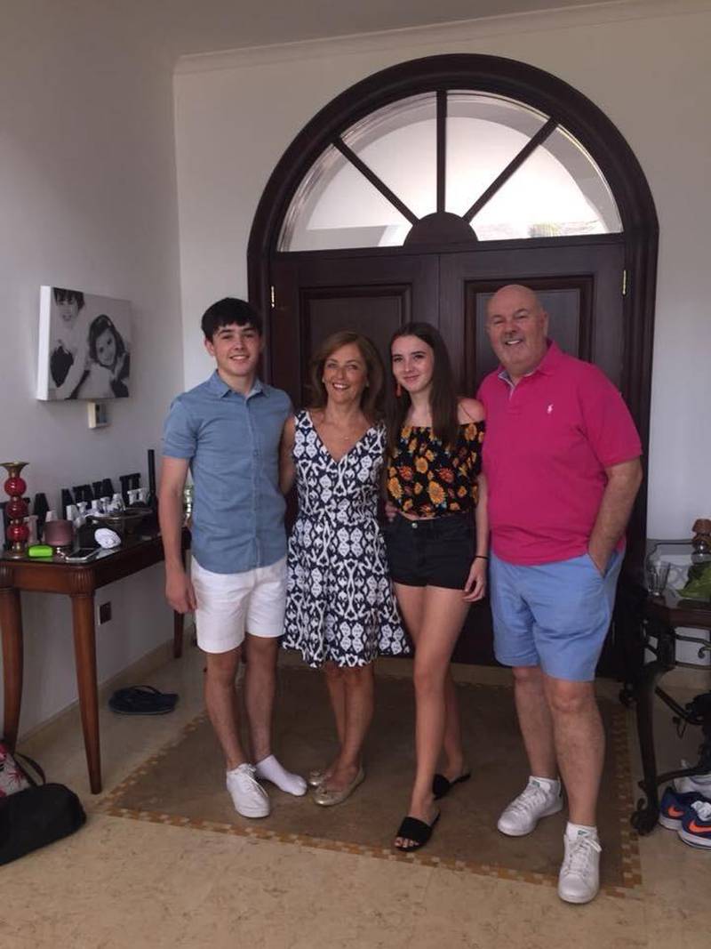 From left, Hannah's brother Ryan with mother Linda, Hannah and father Jim at the family villa in Dubai. Photo: Muldoon family