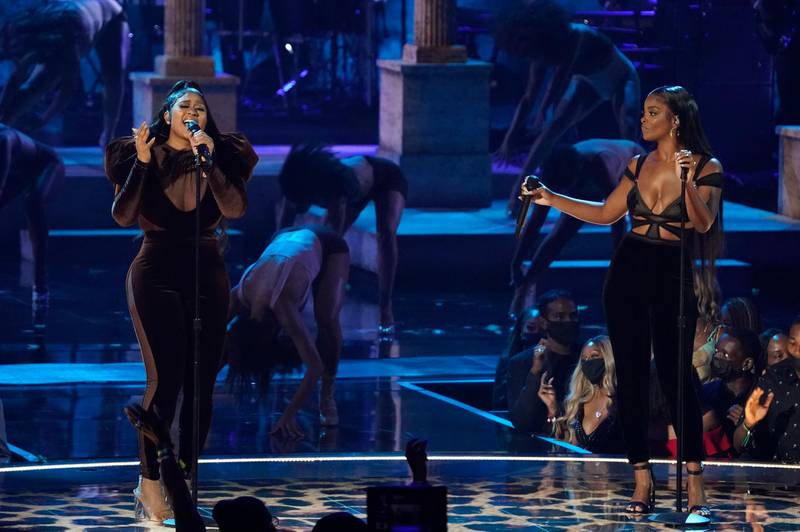 Jazmine Sullivan, left, and JT, of City Girls, perform at the BET Awards. AP