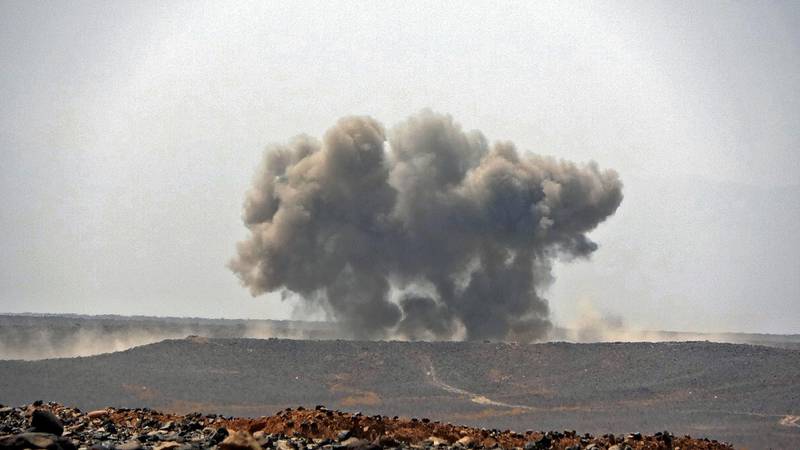 Smoke billows during clashes between forces loyal to Yemen's Saudi-backed government and Huthi rebel fighters in Yemen's northeastern province of Marib on March 5, 2021.  / AFP / -
