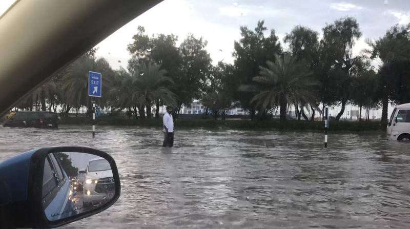 A screenshot from the video showing flooding in  Airport Road heading in towards the city in Abu Dhabi. Steve Luckings / The National