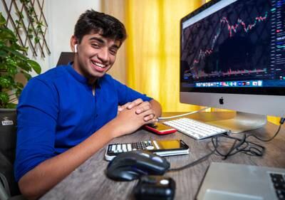 Advait Arya, a 16-year-old student in Abu Dhabi, started trading in the stock market with Dh8,000 to keep himself occupied during the summer break and Covid-19-induced mobility restrictions last year. Victor Besa / The National
