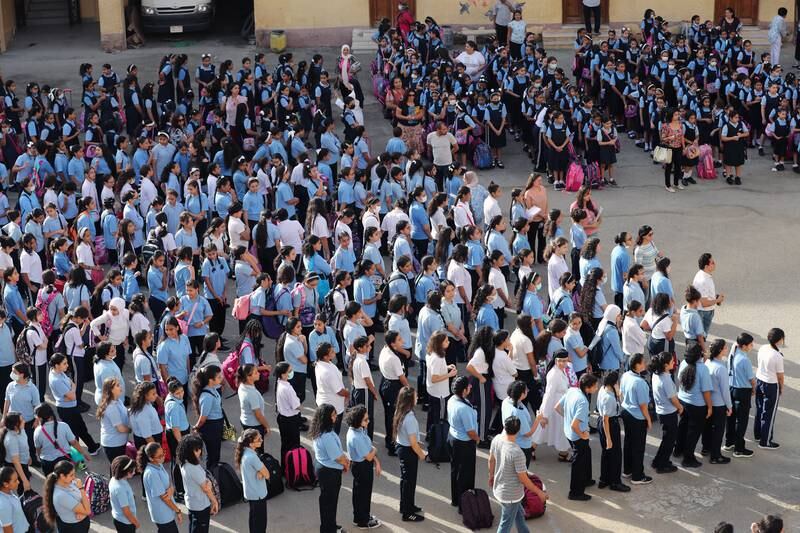 Pupils at a private Cairo school attend assembly on the first day back from the summer break. EPA