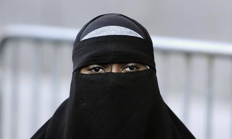 Many who wear the niqab say most of the confusion surrounding it comes from a lack of understanding. “Most people wear it by choice and making people take it off, that is the oppression,” says one UAE wearer. Anthony Behar/ Sipa USA