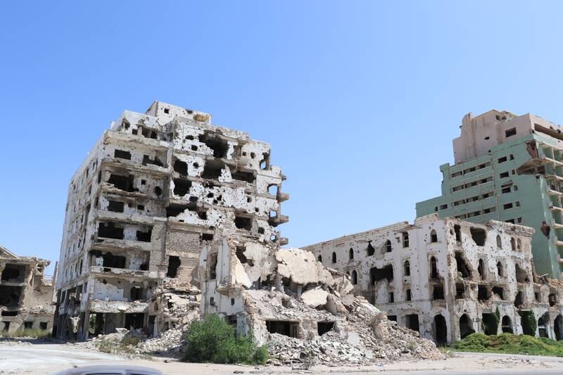 Damaged bank and commercial buildings in the Al Sabri area of  Benghazi. Thousands of homes in the neighbourhood were also destroyed by fighting. 