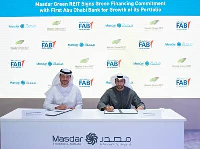 The agreement between Masdar's Green Reit and First Abu Dhabi Bank was announced at the fourth Abu Dhabi Sustainable Finance Forum. Photo: Masdar