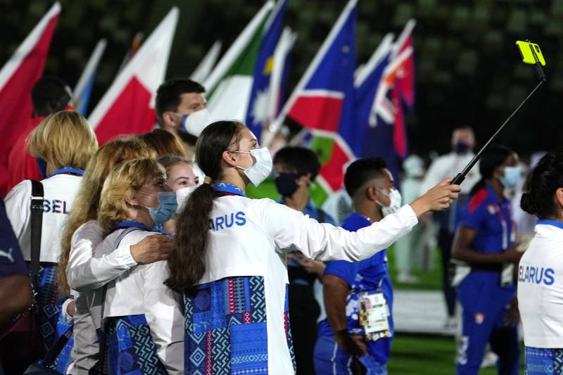 Belarus's athletes enter the stadium during the closing ceremony.