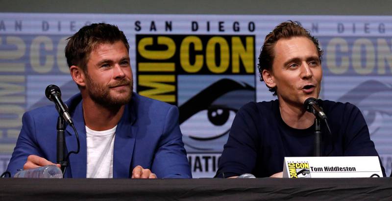 Cast members Chris Hemsworth (L) and Tom Hiddleston at a panel for "Thor: Ragnarok" during the 2017 Comic-Con International Convention in San Diego, California, U.S., July 22, 2017.   REUTERS/Mario Anzuoni
