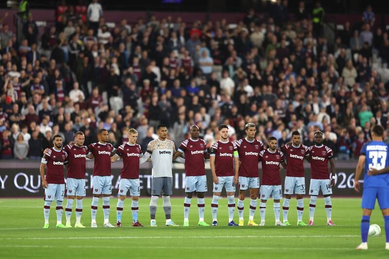West Ham United players observe a minute's silence. Getty