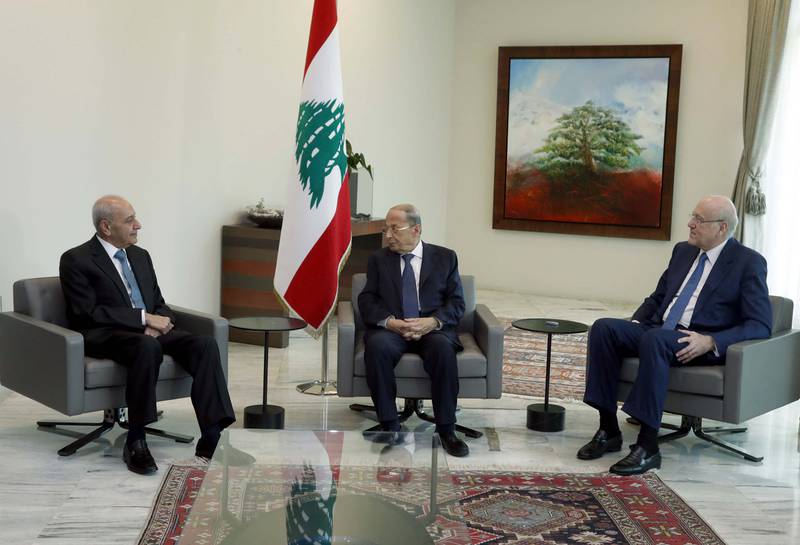 President Michel Aoun meets Parliament Speaker Nabih Berri and Prime Minister-designate Najib Mikati at the presidential palace in Baabda before the announcement of the formation of a new government under Mr Mikati. Dalati and Nohra / AFP