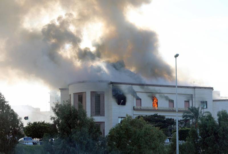 Smoke rises from the site of the headquarters of Libya's foreign ministry after suicide attackers hit in Tripoli. Reuters