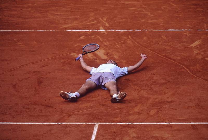 10 June 2001:  Gustavo Kuerten of Brazil celebrates after winning his third successive French Open at Roland Garros, in Paris, France.  \ Mandatory Credit: Clive Brunskill /Allsport