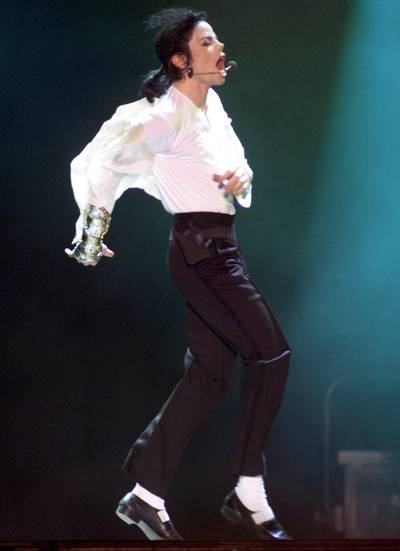 epa06963789 (FILE) - US singer Michael Jackson performs during the benefit concert 'Michael Jackson&Friends' at Olympic Stadium in Munich, Germany, 27 June 1999 (reissued 22 August 2018). Michael Jackson, the self-appointed 'King of Pop', would have turned 60 on 29 August 2018. He died on 25 June 2009 aged 50 after suffering a cardiac arrest.  EPA/JAN NIENHEYSEN  GERMANY OUT *** Local Caption *** 01774815