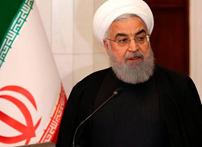 Iranian President Hassan Rouhani holds a press conference with his Iraqi President Barham Salih at Salam Palace in Baghdad, Iraq, Monday, March 11, 2019. Rouhani was in Baghdad on Monday, making his first official visit to the nation that Tehran once fought a bloody war against and later backed in the battle with the Islamic State group. (AP Photo/Khalid Mohammed)