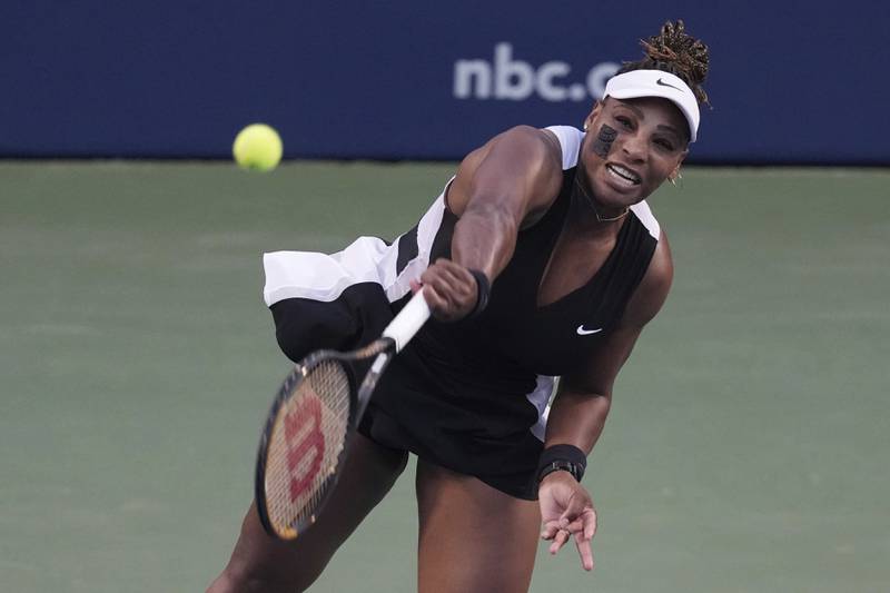 Serena Williams, of the United States, serves to Belinda Bencic, of Switzerland, during the National Bank Open tennis tournament Wednesday, Aug.  10, 2022, in Toronto.  (Chris Young / The Canadian Press via AP)