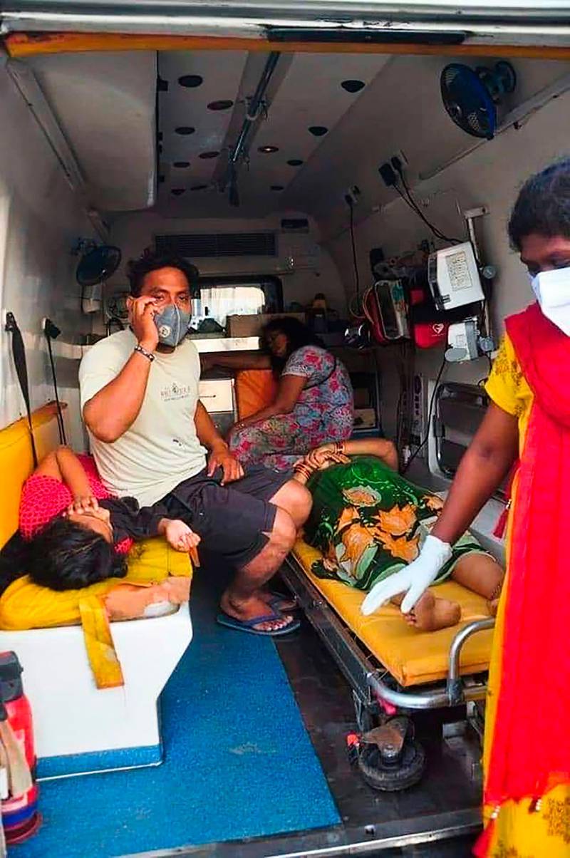 Women are taken to a hospital  in an ambulance following a gas leak at the LG Polymers plant in Visakhapatnam. AFP