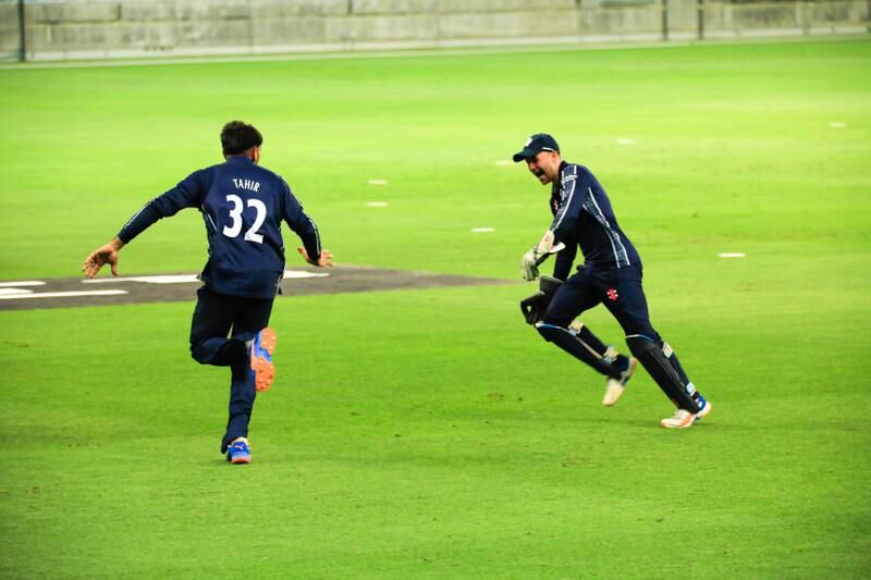 Hamza Tahir begins the celebrations after his match-winning catch for Scotland against Oman. Photo: ICC