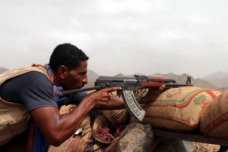 epa06912152 A member of Yemeni government forces takes position during an offensive against Houthi positions on the outskirts of the western port city of Hodeidah, Yemen, 26 July 2018. According to reports, Yemen has been engulfed in a violent conflict between the Saudi-backed government and Houthi rebels since 2015, while UN Special Envoy to Yemen Martin Griffiths tires to push for a deal with Houthi militia leaders to cede control of the Red Sea port of Hodeidah to a UN-supervised committee, in an attempt to end the Saudi-led coalition assault on Hodeidah city.  EPA/NAJEEB ALMAHBOOBI