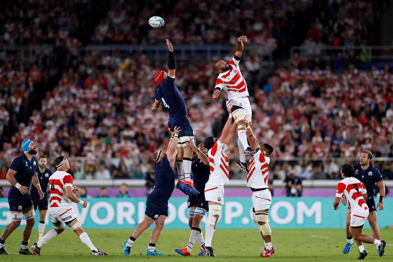 Scotland lock Grant Gilchrist and Japan flanker Michael Leitch jump for the ball in a line out. AFP