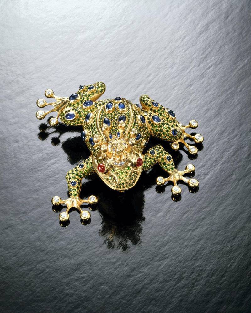 Frog brooch for Danielle Steele. In keeping with the novelist’s colourful oeuvre, gemstone artist Andreas von Zadora-Gerlof rendered her brooch in 18K gold, with pavé emerald, blue sapphire and diamond details, and ruby cabachon eyes