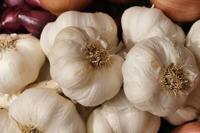 One study reported that garlic extract reduced both systolic and diastolic blood pressure in hypertensive people. Getty