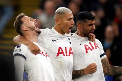 Tottenham Hotspur's James Maddison, Richarlison and Christian Romero celebrate after Joel Ward's own-goal. PA 