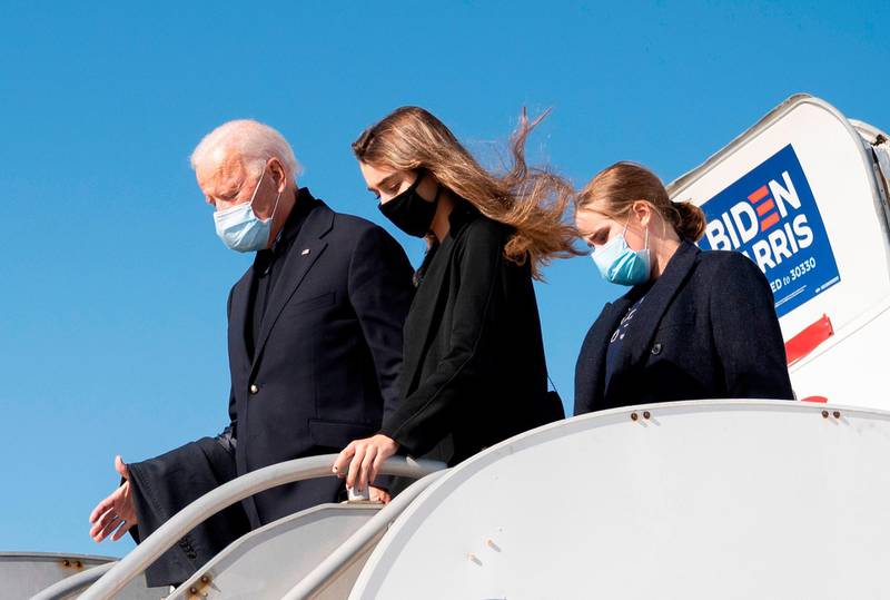 Democratic Presidential Candidate Joe Biden arrives with his granddaughters in Flint, Michigan.  AFP
