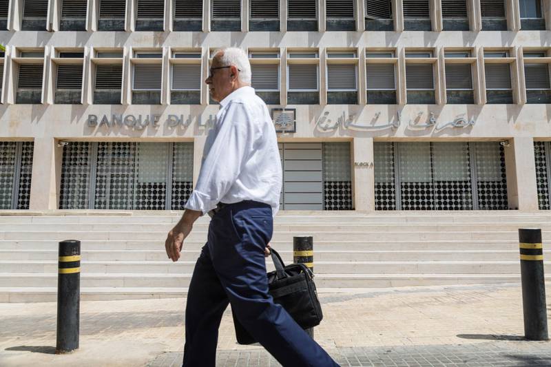 A pedestrian passes the headquarters of Lebanon's central bank, also known as Banque du Liban, in Beirut, Lebanon, on Tuesday, July 24, 2018. Lebanon’s banks are paying the highest interest rates on deposits in almost nine years as lenders seek to shore up their capital to cope with political uncertainty and the high borrowing needs of the government. Photographer: Sima Diab/Bloomberg
