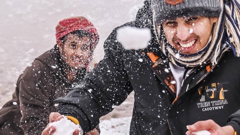 An image that illustrates this article Saudis enjoy the snow - in pictures