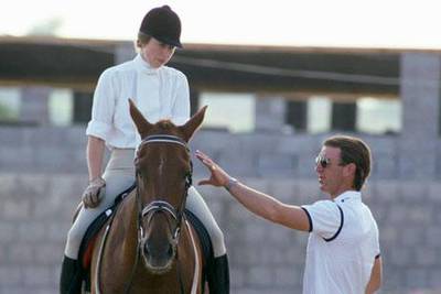 Princess Anne with her first husband, Captain Mark Phillips, in Abu Dhabi, 1984. Tim Graham / Getty Images