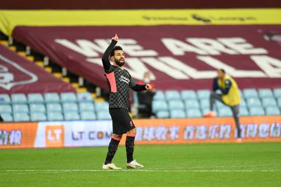 Salah celebrates after scoring his side's second goal. AP