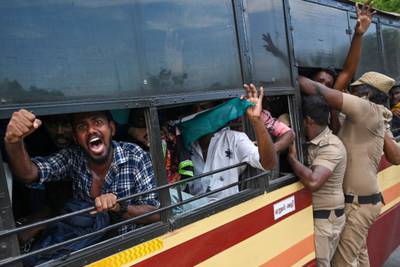 Police detain protesters during a demonstration against the government's new 'Agnipath' recruitment scheme for the army, navy, and air force in Chennai, India. All photos: AFP