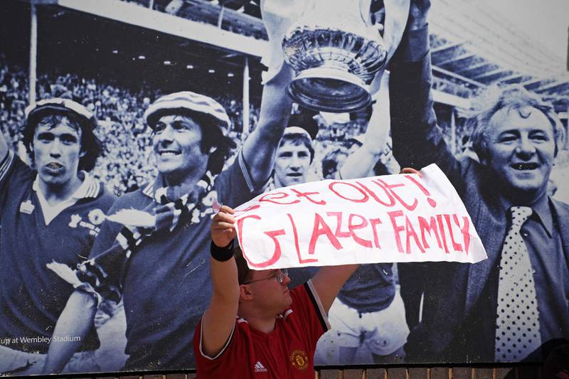 Supporters protest against Manchester United's owners outside Old Trafford stadium. AFP