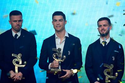 Josip Ilicic, Cristiano Ronaldo and Miralem Pjanic on stage at the Gran Gala del Calcio 2019 ceremony. AFP